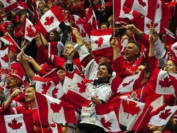 Canada flag and skyline for Fitch Canada AA rating analysis